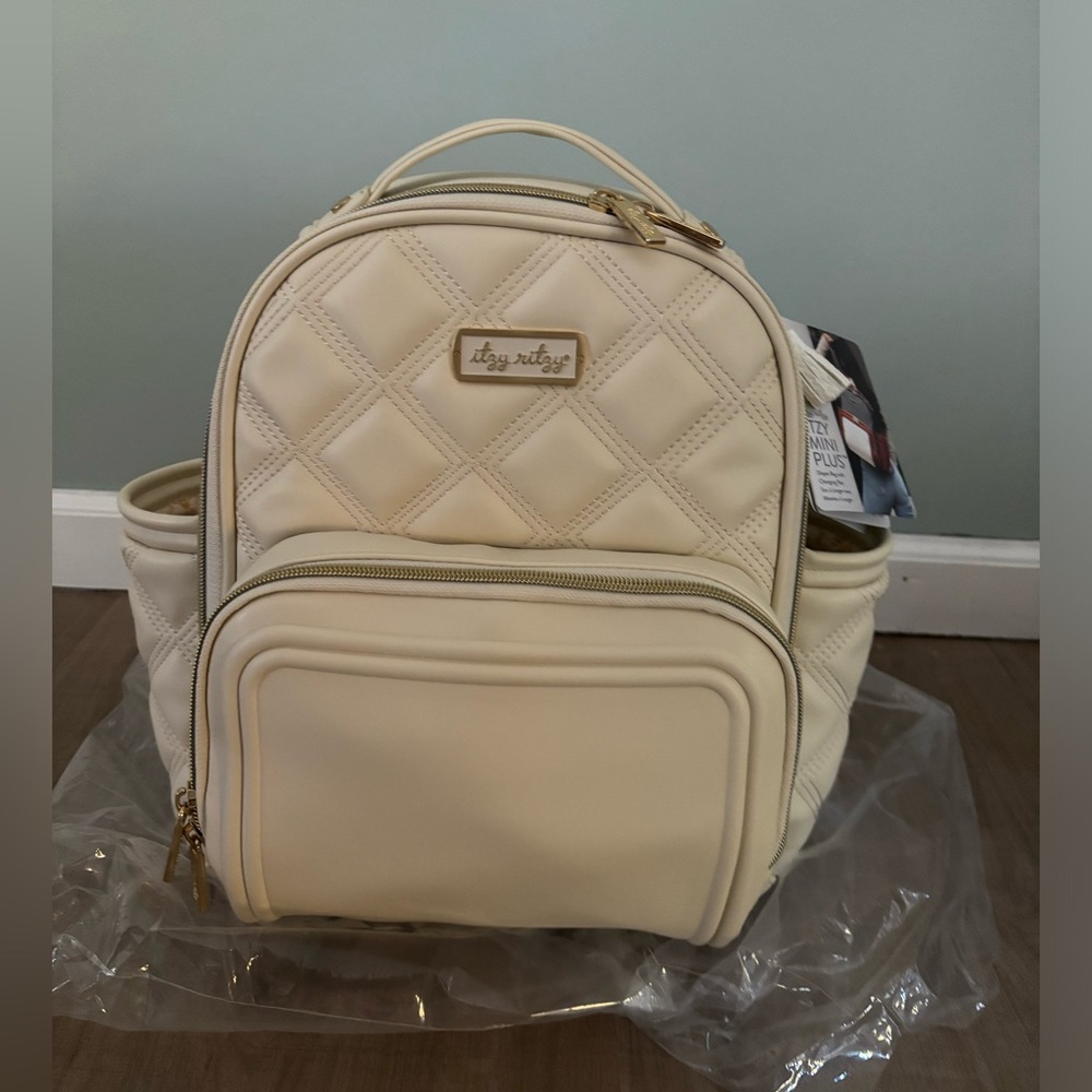Itzy ritzy mini plus